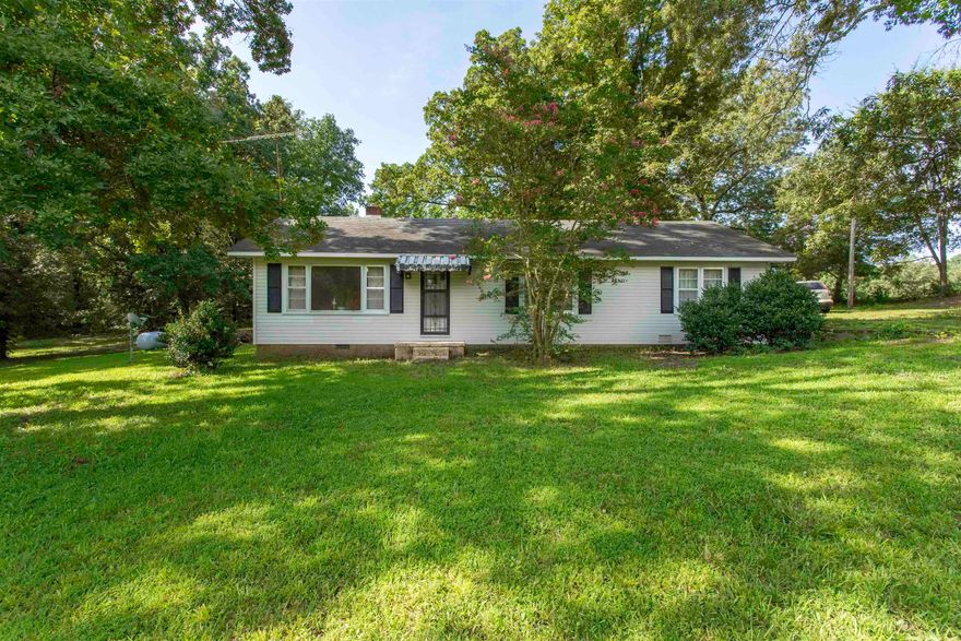 Charming Country Home on 2.38 Acres – Across from Lake Charles State Park  Discover peace and privacy in this 3 bed, 2 bath country home set on 2.38 acres of gently rolling land. Located directly across from Lake Charles State Park, this property offers a prime location with endless outdoor recreation just steps away.  The home features a warm, functional layout perfect for full-time living or a weekend retreat. Enjoy the park-like setting with mature hardwood trees that provide natural shade and beauty year-round.  A spacious 30x36 shop adds incredible value—ideal for storage, hobbies, or a workshop. Enclosed sewing / hobby room within shop w/window air. Whether you’re enjoying the quiet of the country or gearing up for adventure at the lake, this home delivers the best of both worlds.  Highlights:    3 Bedrooms, 2 Bathrooms 2.38 Scenic Acres 30x36 Detached insulated Shop With wood stove  New gas water heater Directly Across from Lake Charles State Park Mature Trees & Park-Like Atmosphere Peaceful, Private Setting  Don’t miss this rare opportunity to own a slice of country paradise in a highly desirable location. Call today to schedule a showing