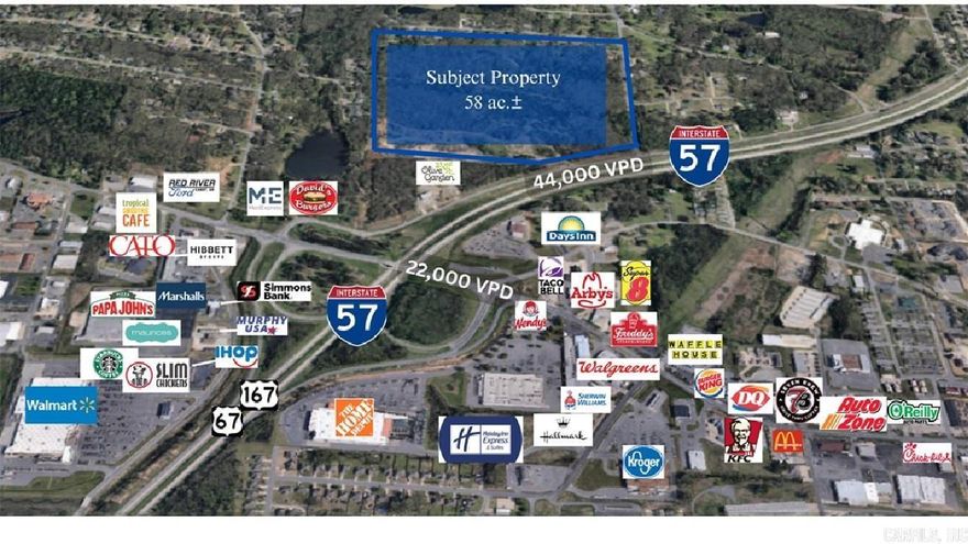 RARE OPPORTUNITY!  58.1 acres with high visibility and Interstate 57 frontage (formerly Hwy 67/167).  This development opportunity is in an area of explosive community & commercial growth, adjacent to the newly constructed Olive Garden.  With an estimated daily traffic count of 44,000, this property is ready for a Planned Development (commercial/mixed-use), big box retail shopping, and anything in between.  City utilities available. Currently Zoned R-1 but should easily be rezoned based on proposed use.