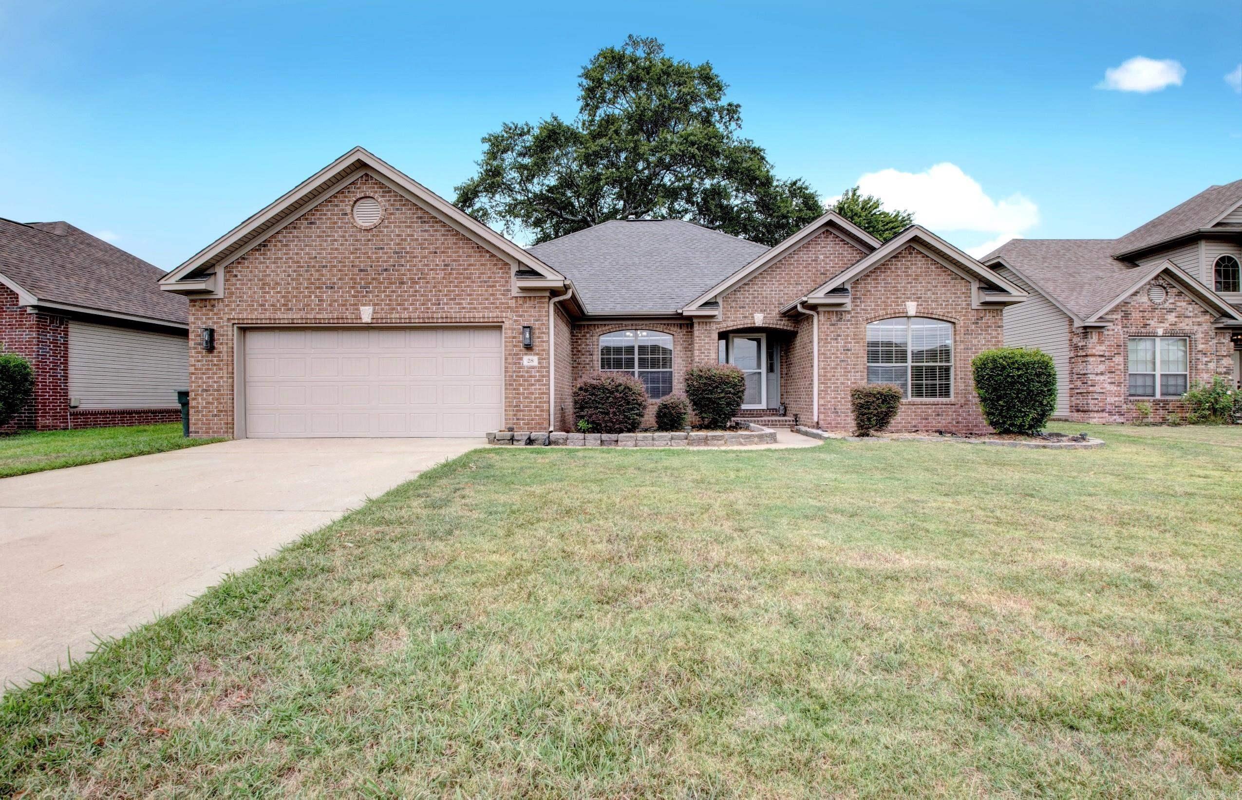Check out this Lovely Home in Otter Creek! The open floor plan features a formal dining area, big family room with fireplace and tons of cabinet space in the kitchen. Home offers lovely wood floors and trim. Master is separate; with spacious closet, jetted tub and stand up shower. New carpet in the bedrooms! Out back offers covered patio and a big backyard. Just minutes away from the LR outlet mall, Movie Tavern, Bass Pro Shop and restaurants! Amenities in this gated community include swimming, tennis courts, club house and much more! Hurry to see it!