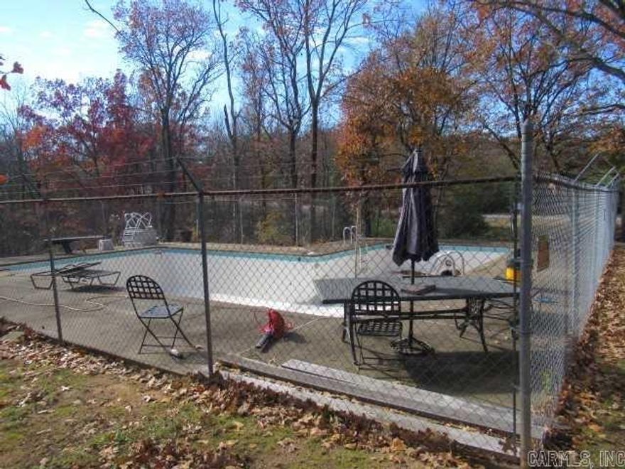 Vacant lot with inground swimming pool. Being sold along with MLS #23031280