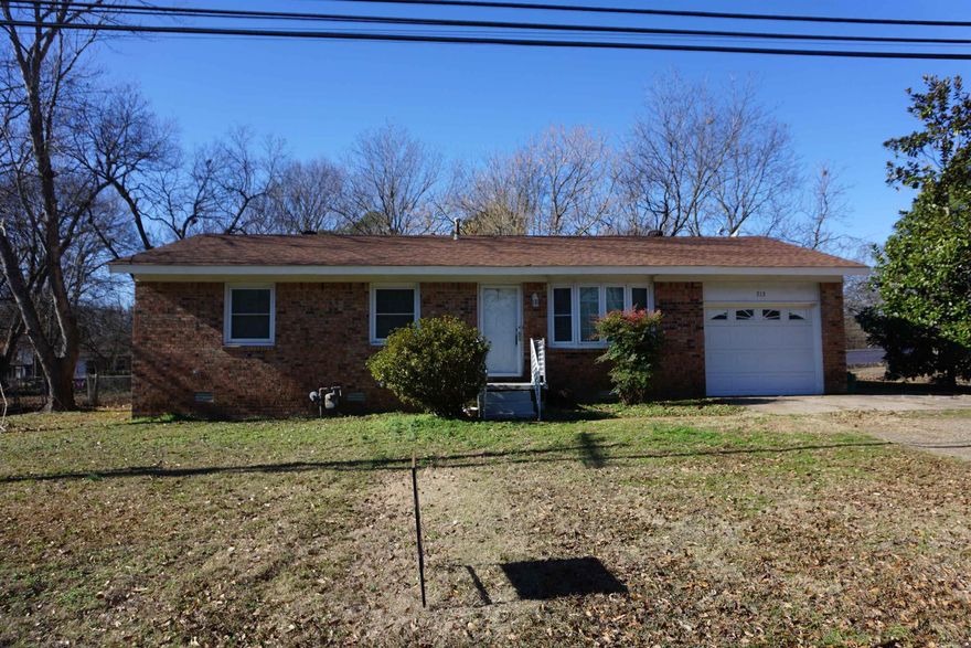 Very well kept 3/2 brick home with a wonderful fenced in back yard in Judsonia. The living room is large and is light neutral and opens into the eat in kitchen that has lots of cabinets. The refrigerator in the kitchen will stay.  The laundry room is off the kitchen and also has storage cabinets. The 1 car garage also has a space in the back for storage.  The house has laminate flooring throughout except the bedrooms which are carpeted. Both bathrooms have been remodeled and have new toilets, vanities and in the main bathroom there is a tub/shower unit and the master bedroom there is a large walk in shower. The roof was replaced in 2020, the plumbing under the house was replaced and new energy efficient tilt in windows were installed in 2013 and a new water heater was installed in 2024. The covered back patio is perfect for sitting and watching the kids play in the fenced in back yard and this is only a block from the Library and city park !