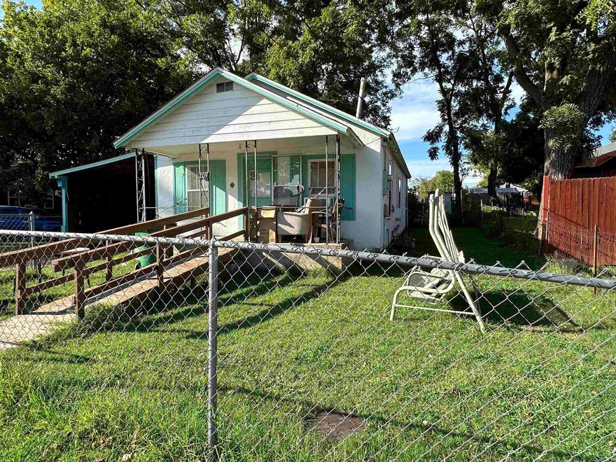 INTRODUCING A FANTASTIC OPPORTUNITY IN THE WORLD OF REAL ESTATE! This 2 bedroom, 1 bath home boasts a wealth of potential and is the perfect canvas for those looking to create their dream space. Nestled in a peaceful neighborhood, the property features a fenced backyard that's perfect for pets or outdoor activities. You'll appreciate the lovely front & back yards, offering a glimpse of greenery & tranquility. A detached carport provides a convenient shelter for your vehicles, while a storage shed offers extra space for your tools & belongings. It's an excellent choice for first-time home buyers looking to make their mark or investors seeking an attractive opportunity. With a bit of tender loving care this property can be transformed into a comfortable & stylish living space that suits your needs. This property is priced to sell quickly, don't let this fantastic opportunity pass your by.