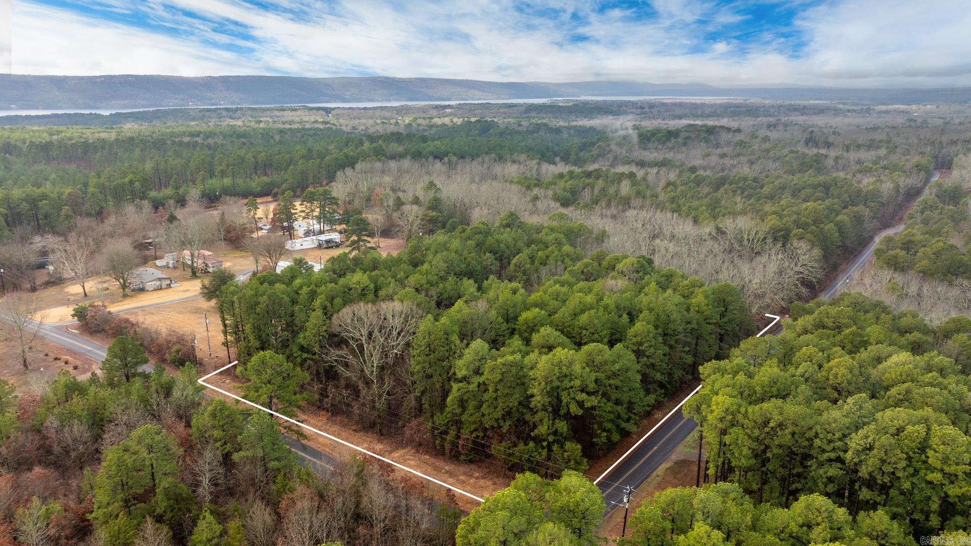 Almost TWO ACRES of prime land, just around the way from Shiloh Marina. Utilities at the street for easy connection. Great internet service available. Easy grading that would make for a fantastic build site.