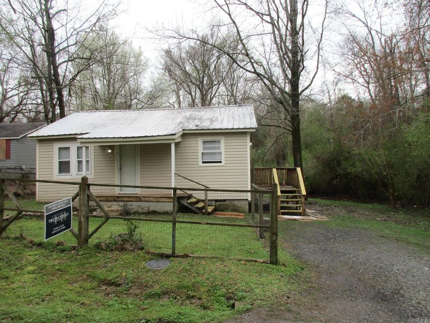 First time home buyers, or downsizers, and investors.  Excellent location, close to West Little Rock, stores, schools, UALR, hospitals, and more.  Very clean, fresh paint new flooring.  You have to see it.  House is situated about 0.23 acres, it has a lot of potential.  Come see it.  Property sold AS-IS. Call for an appointment. AGENTS, SEE REMARKS.