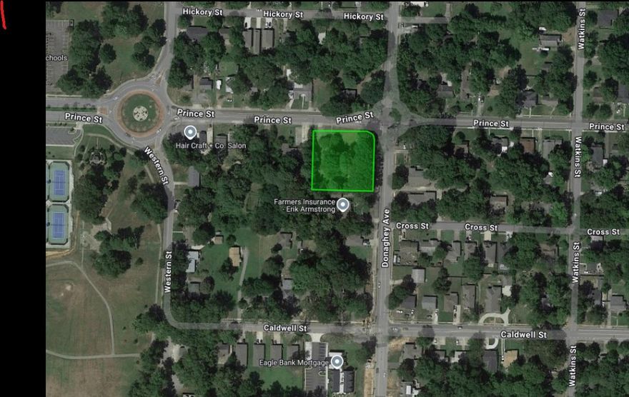Prime opportunity for development! This .77-acre corner lot is perfectly positioned at the intersection of Donaghey Avenue and Prince Street in Conway, AR, offering incredible potential for a quiet office or mixed-use development. The area has seen remarkable growth, with Prince Street welcoming new businesses like Don Pepes, Chipotle, Veterans Park, and Braum's (coming soon) within the past 12 months. Donaghey Avenue has become Conway's most beautiful thoroughfare, thanks to the ongoing expansion of UCA and Conway Regional, both showcasing iconic architecture. Situated near the vibrant downtown and surrounded by both commercial and residential development, this lot is ideal for those looking to capitalize on Conway's thriving market. Don’t miss your chance to develop in one of the city’s fastest-growing and most desirable locations!