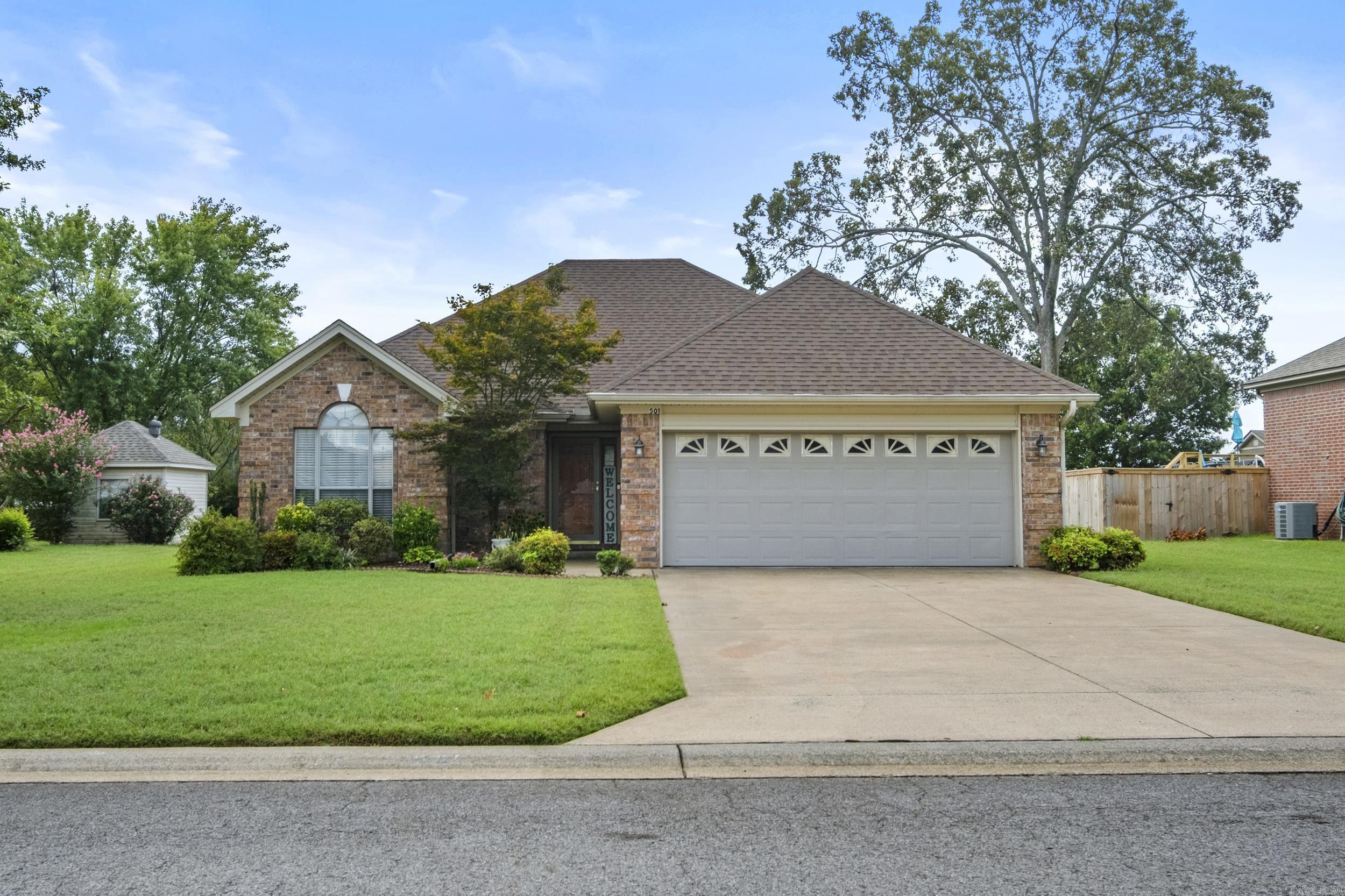 PRIDE OF OWNERSHIP shows throughout this Beautiful 3-bedroom, 2-bath Brick home located in the highly sought-after Cabot School District. Conveniently situated just minutes from Highway access for easy commute, this home offers an inviting & functional floor plan designed for comfortable living. The spacious great room features beautiful Hardwood Floors and gas fireplace with built-ins for added character.. The Kitchen includes a pantry, breakfast area, stainless appliances, & Sink windows overlooking the back yard. The Split floor plan offers added privacy, with a large Primary Suite, featuring a walk-in closet, separate his-and-hers closets in the bathroom, a wak-in shower, a make-up vanity, & linen tower. Both guest bedrooms are generously sized with ample closet space, and a vault ceiling in one of the guest rooms. The backyard is beautifully landscaped and includes a covered patio with an additional automatic retractable canopy. A storage building that matches the home's exterior provides extra space for your lawn tools or hobbies. Recent updates include a new roof,(2022) & a new water heater (2022). This home is Immaculate, Well Maintained & Move-In Ready! See Video!