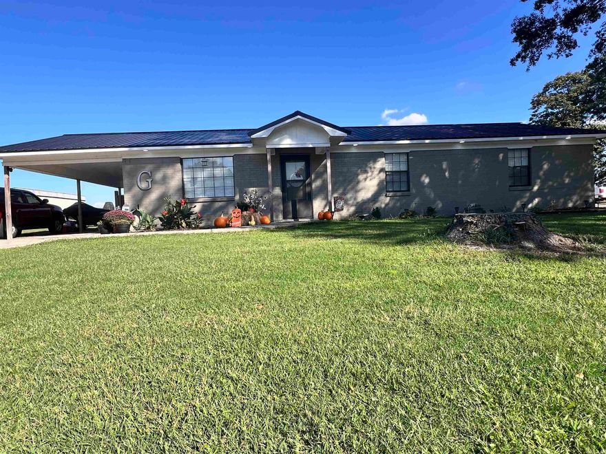 This well-maintained 3-bedroom, 2-bath ranch-style home has seen many recent improvements, making it move-in ready and easy to love. Inside, you’ll find updated flooring throughout, including luxury vinyl plank and new carpet, as well as beautifully refreshed bathrooms. The kitchen includes a refrigerator that conveys with the sale. The home’s major systems and finishes have been thoughtfully updated: a metal roof was installed in 2023, the water heater was replaced around the same time, the HVAC unit is approximately six years old, and both the exterior and interior have been freshly painted (exterior in 2024, interior in 2025). Out back, enjoy a nice-sized storage shed with two covered bays. This home combines practical updates with comfortable living spaces, ready for its next owner to enjoy!