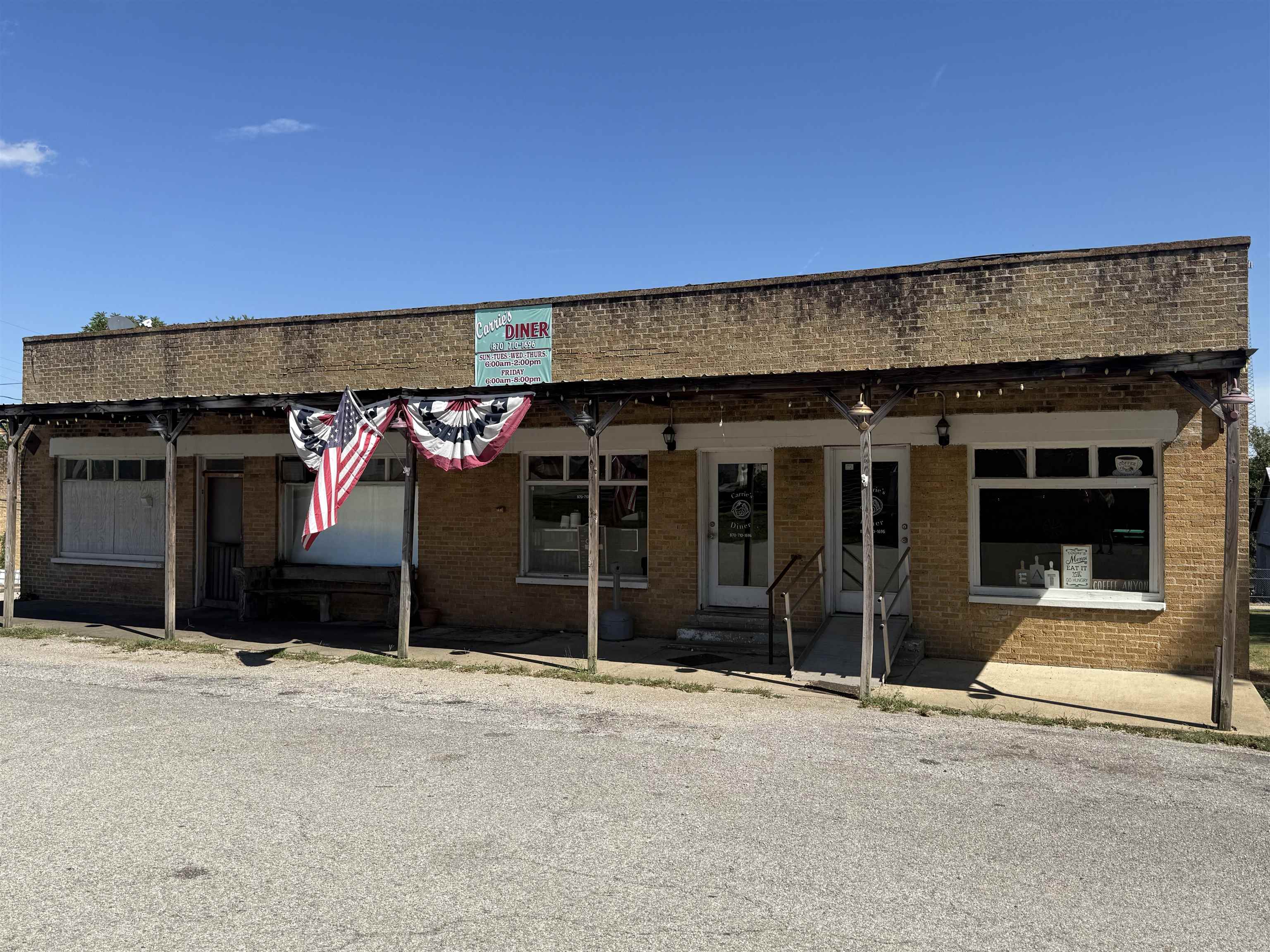 Have you always dreamed of owning your own business?? Formerly a well-established diner, this building is already set up to be a restaurant, but that could always be changed if you have something else in mind! The building features central heat and air in the dining area, and central air in the kitchen area (the heat from cooking shouldn't let you get cold in the kitchen area). There is also a basement area for storage, or you could put an office in it. There are a lot of possibilities with this great location, just off of Highway 63!