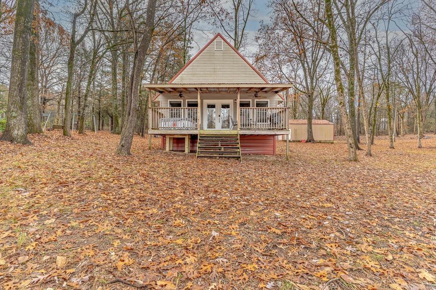 Welcome to 1815 Stubblefield Rd in Pocahontas, AR. This is a charming, fully furnished getaway just a short walk from the Eleven Point River. This 2-bedroom, 1-bath property also features a spacious loft that comfortably fits two beds, allowing the home to sleep up to 7-10 guests comfortably.  This property is surrounded by vacation rentals in a highly desirable recreational area. A private community boat ramp is available to land owners for easy river access, and an additional 0.22-acre riverfront lot is also available for purchase depending on the offer, perfect for buyers wanting even more space or future investment potential. The home offers low-maintenance living with a metal roof, vinyl siding, and metal underpinning. A large attached 20x30 shop with two garage doors provides ideal storage for kayaks, boats, fishing gear, and river floats. Sitting on 0.30 acres, this property is an excellent opportunity for a full-time residence, weekend retreat, or continued short-term rental use. Furnishings are negotiable, and the property can remain turnkey for the next owner. Call to schedule your showing today.