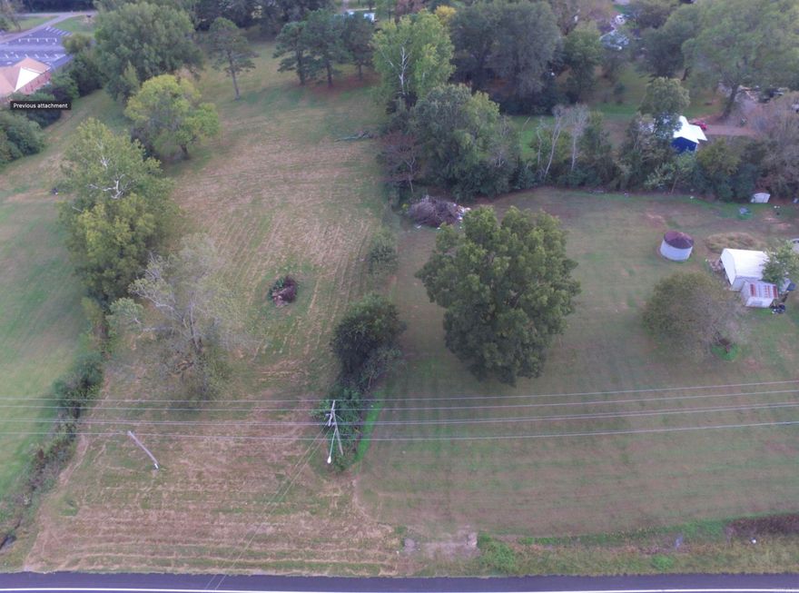 0.71 Acre lot with endless potential facing Highway 64.