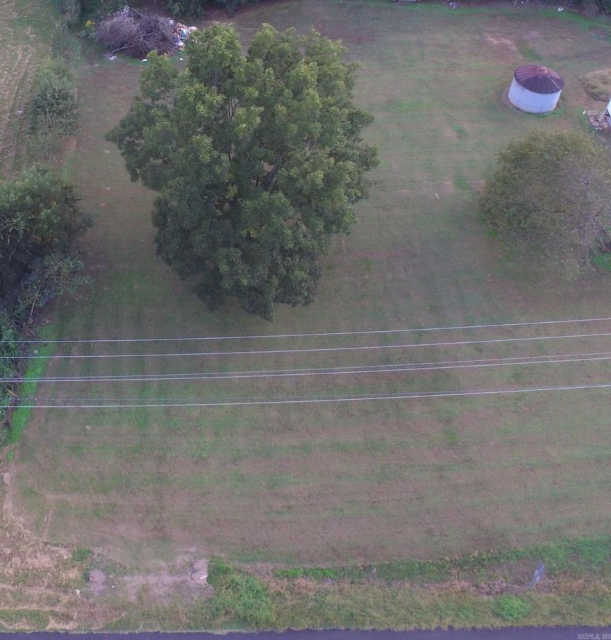 0.71 Acre lot with endless potential facing Highway 64.