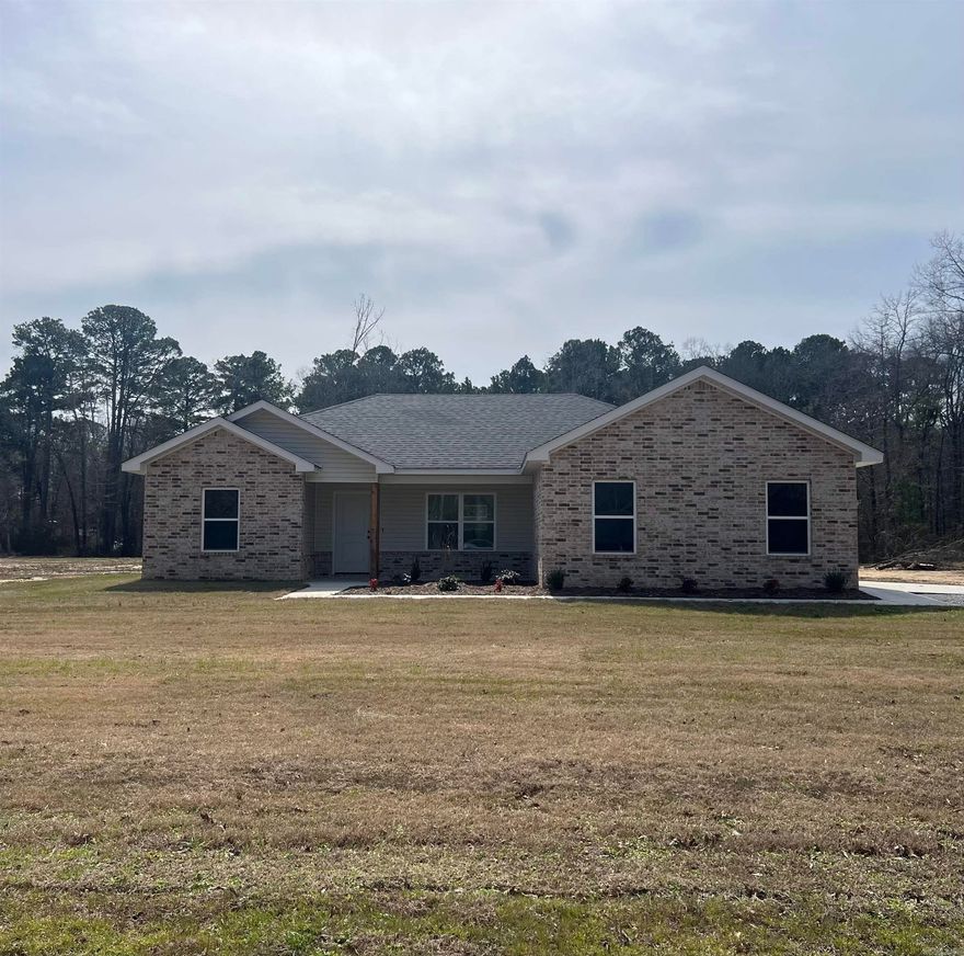 Looking for a NEW CONSTRUCTION HOME ON AN ACRE? Level lots with custom cabinets, Quartz countertops, stainless steel appliances. This beautiful home features 3 bedroom, 2 full bathrooms. Kitchen, dining, and living room all open. Split bedroom plan, side load 2 car garage. Nice closets throughout. Master bedroom is good size with a walk-in closet. Back sliding glass door and all the windows brings natural light in the home. Parking pad in front of garage. The driveway will be gravel. Home will have a sidewalk from parking pad to front porch and small flower bed. You will not want to miss out on this great home. Schedule your showing today! ****SELLER CONCESSIONS UP TO $5,000.00 WITH ACCEPTABLE OFFER. Back on the market no fault of seller. Financing fell through.