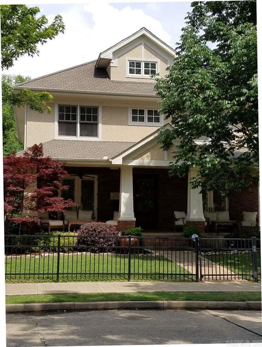 Fantastic family home built in 2006.  Huge open, updated kitchen area with vaulted ceiling and wall of windows across back.  Six bedrooms with four full baths and 1 half bath.  Master suite down.  3rd floor playroom.  All the extras - A must see!  This home is Energy Star Certified.