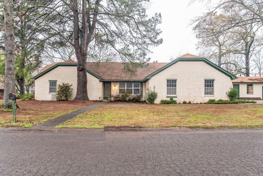 This all-brick home with shop/3rd garage, presents the perfect blend of peace and convenience. Boasting 3 bedrooms and 2.5 bathrooms, this property features a side-entry garage and is situated on a spacious corner lot, offering both privacy and ample outdoor space. Just moments away, you'll find an array of shopping and dining options, ensuring that everything you need is within easy reach. Inside, the home has been thoughtfully updated with new flooring, fresh paint, and new appliances, making it move-in ready.