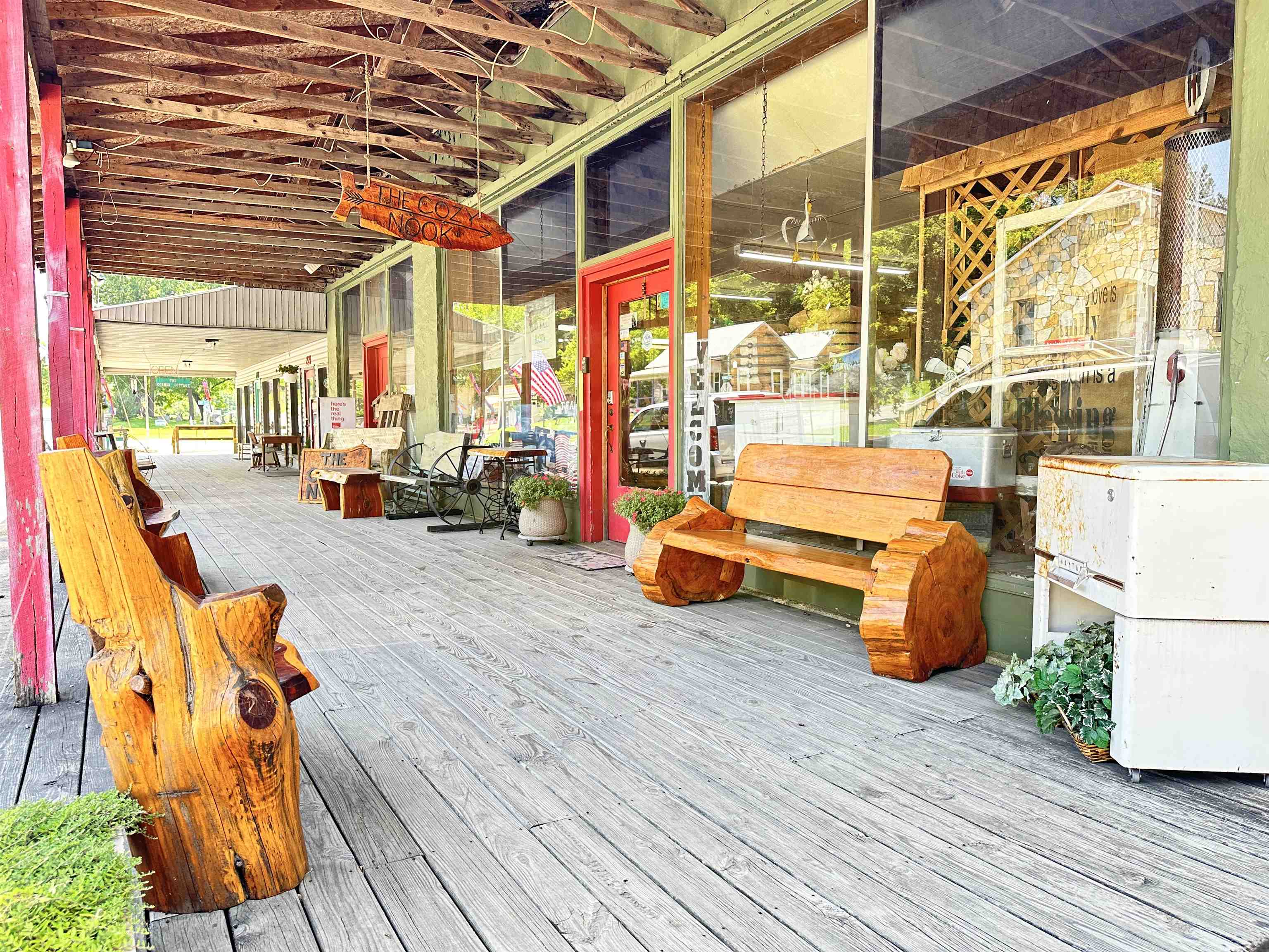 Historic Downtown Hardy Storefront with all the charm and square footage one could ask for! A Fabulous 9,000 square feet!! Beautiful old windows, rock work, hard wood flooring, old antique open beam ceilings just to name a bit of the character in what used to be an old lumber store on Main Street. Having been built to carry a tremendous weight load, it is as solid as a century old building could be! This particular location has been a popular site for photography as well. Wiring has been updated. It is currently being used as a retail store but the possibilities are ENDLESS! Think restaurant, lodging, dance club, retail and more!