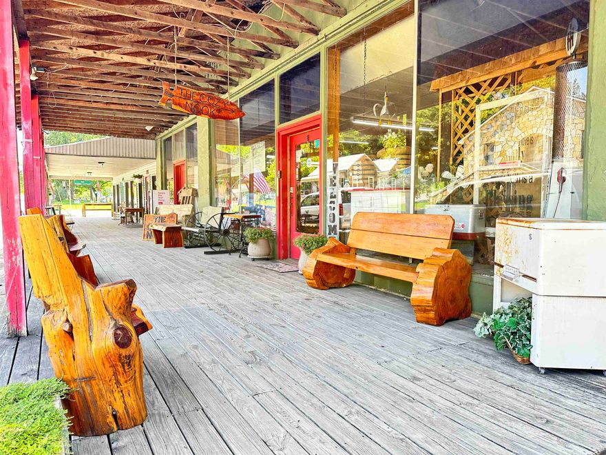 Historic Downtown Hardy Storefront with all the charm and square footage one could ask for!  A Fabulous 9,000 square feet!!  Beautiful old windows, rock work, hard wood flooring, old antique open beam ceilings just to name a bit of the character in what used to be an old lumber store on Main Street.  Having been built to carry a tremendous weight load, it is as solid as a century old building could be! This particular location has been a popular site for photography as well.  Wiring has been updated. It is currently being used as a retail store but the possibilities are ENDLESS! Think restaurant, lodging, dance club, retail and more!