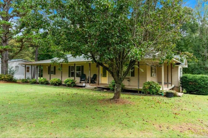 This well-maintained 3 bedroom, 2 bathroom manufactured home sits on approximately .75 of an acre in a quiet area near the river, offering plenty of space and a peaceful setting.  Inside, you’ll find an open floor plan with a spacious kitchen featuring a large farmhouse sink and island, perfect for cooking and gathering. The home also includes a large front porch and covered back patio, giving you plenty of room to relax and enjoy the outdoors.  All appliances stay with the home, making it move-in ready. The home has a newer roof and HVAC system, along with additional window units for extra cooling comfort. The septic system was serviced 3 years ago, and major updates include attic insulation and crawlspace encapsulation completed in 2025.  The home was completely remodeled and added onto in 2001, blending updated features with extra living space. The property stretches all the way to the opposite corner, offering additional room and potential for another home or future expansion.  If you’re looking for space, updates, and a quiet location close to the river, this property is definitely worth a look.