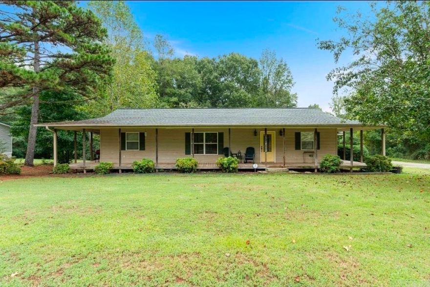 This well-maintained 3 bedroom, 2 bathroom manufactured home sits on approximately .75 of an acre in a quiet area near the river, offering plenty of space and a peaceful setting.  Inside, you’ll find an open floor plan with a spacious kitchen featuring a large farmhouse sink and island, perfect for cooking and gathering. The home also includes a large front porch and covered back patio, giving you plenty of room to relax and enjoy the outdoors.  All appliances stay with the home, making it move-in ready. The home has a newer roof and HVAC system, along with additional window units for extra cooling comfort. The septic system was serviced 3 years ago, and major updates include attic insulation and crawlspace encapsulation completed in 2025.  The home was completely remodeled and added onto in 2001, blending updated features with extra living space. The property stretches all the way to the opposite corner, offering additional room and potential for another home or future expansion.  If you’re looking for space, updates, and a quiet location close to the river, this property is definitely worth a look.