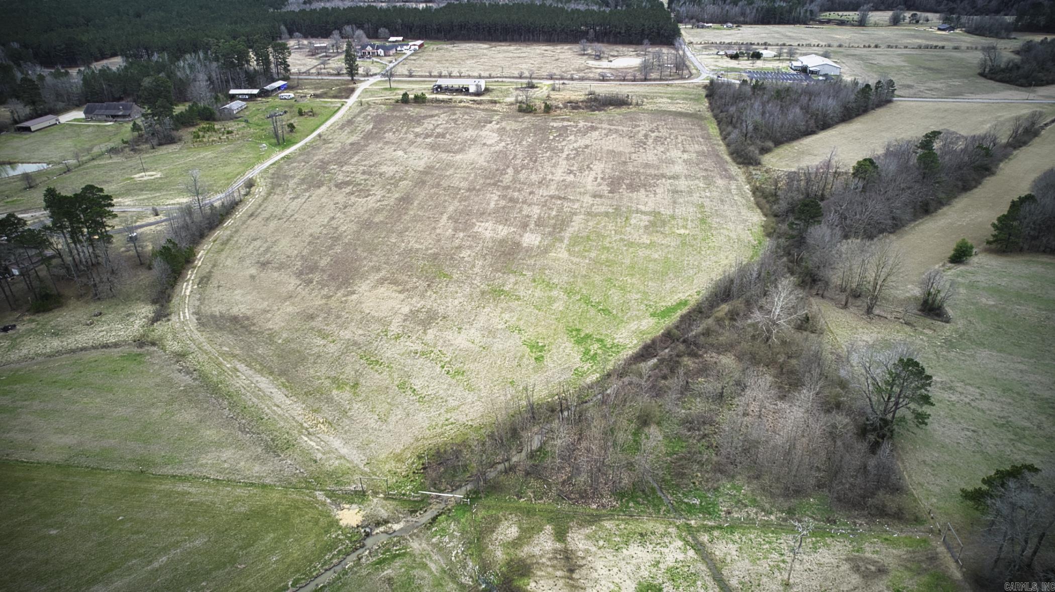 Discover this beautiful 22.64 acre property, featuring panoramic views and a charming barn. Whether you're looking to build your dream home, establish a farm, or create a private retreat, this expansive land offers the perfect setting. Enjoy the peace and privacy of rural living with easy access to nearby amenities.