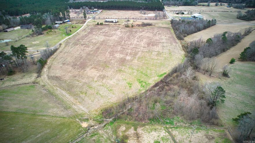 Discover this beautiful 22.64 acre property, featuring panoramic views and a charming barn. Whether you're looking to build your dream home, establish a farm, or create a private retreat, this expansive land offers the perfect setting.  Enjoy the peace and privacy of rural living with easy access to nearby amenities.