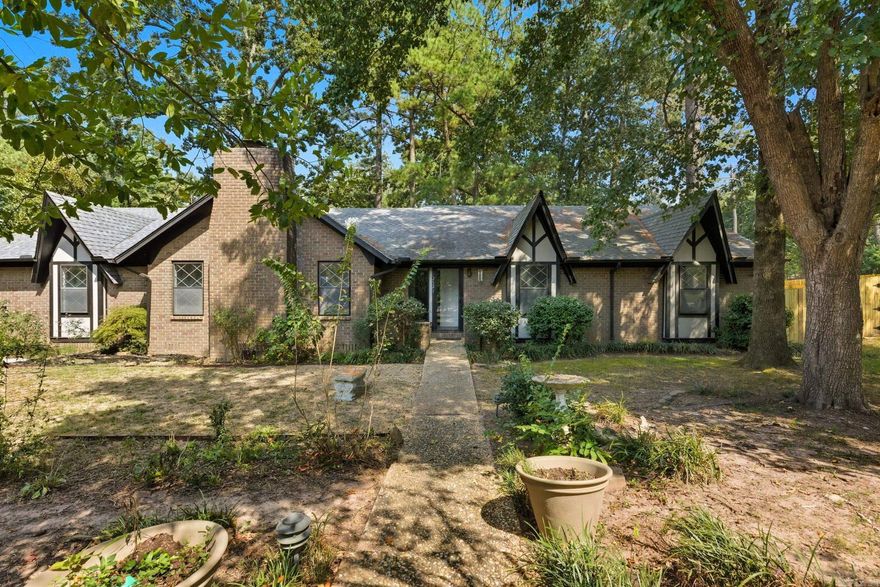 Charming Tudor Revival in the gated Otter Creek Community. 3 bed, 2 bath with vaulted, painted wood ceilings and a beautiful rock fireplace in the living room—perfect for cozy family nights this fall. The spacious primary suite offers a unique lofted area, while the back deck overlooks green space for added privacy. A storm shelter in the garage provides extra safety, and the location can’t be beat—steps from the pool, tennis courts, and directly across from the neighborhood park. Sitting on a corner lot in this very community-oriented neighborhood, you’ll love the welcoming, family-friendly vibes Otter Creek has to offer!