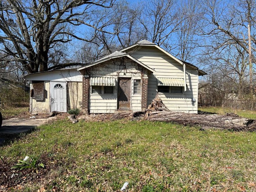 Fixer upper house in Pine Bluff. Nice lot Seller will consider a fair offer. Call today