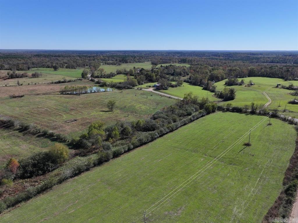 This beautiful 37.05 ± acre property offers prime farmland with expansive hay pastures, perfect for cattle farming. A stocked pond adds to its appeal, providing great fishing opportunities. Abundant wildlife, including deer, turkey, rabbit, and squirrel, make this a hunter’s paradise. Whether you're looking for a productive farm or a country retreat, this picturesque acreage is a fantastic opportunity! Can be purchased with more acreage and a home. See MLS # 25013153