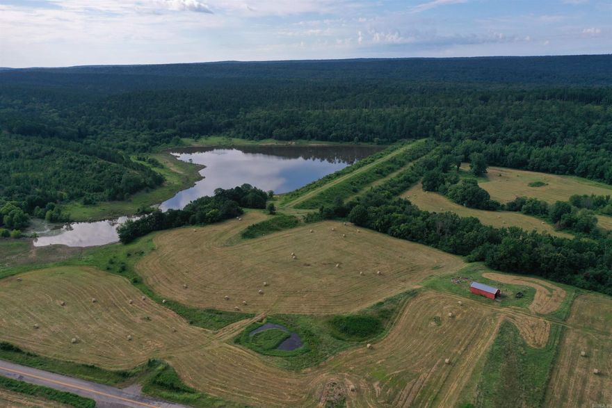 Located conveniently out of Waldron along highway 248 lies this 303 +/- acre outdoorsman’s paradise. If you have been looking for a property to hunt, fish, farm, build, camp, or just relax, this one will be hard to beat. Lush Meadows, timbered ridges, and breathtaking views of the private lake are just a few highlights to this wonderful Ouachita Mountain Property. • 303 +/- Acres • 25 +/- Acre Private Lake • 1.75 Miles of Ouachita National Forest Boundary • Highway 248 Frontage • Power and Water available • Two Smaller Ponds • Excellent Five Strand Barbed Wire fencing • Lush Pastures • Hay Meadows • Abundance of Deer and Turkey • 10 Minutes from Waldron • 1 Hour from Fort Smith