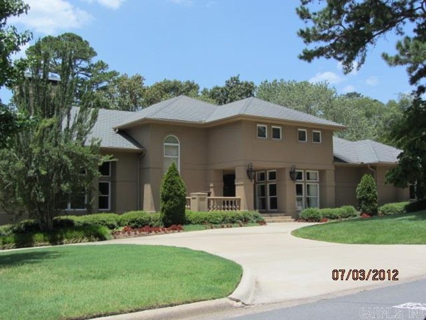 Beautiful custom home completely remodeled from 2000 on.  15ft and 9ft ceilings.  Hardwoods throughout except bedrooms.  Three living with master suite on main level.  Upstairs 3 beds, media room, workout room.  Basement with bedroom/bath.  Three car garage.  Elevator.  Pool and pool house.  On PV golf course.  One of a kind!