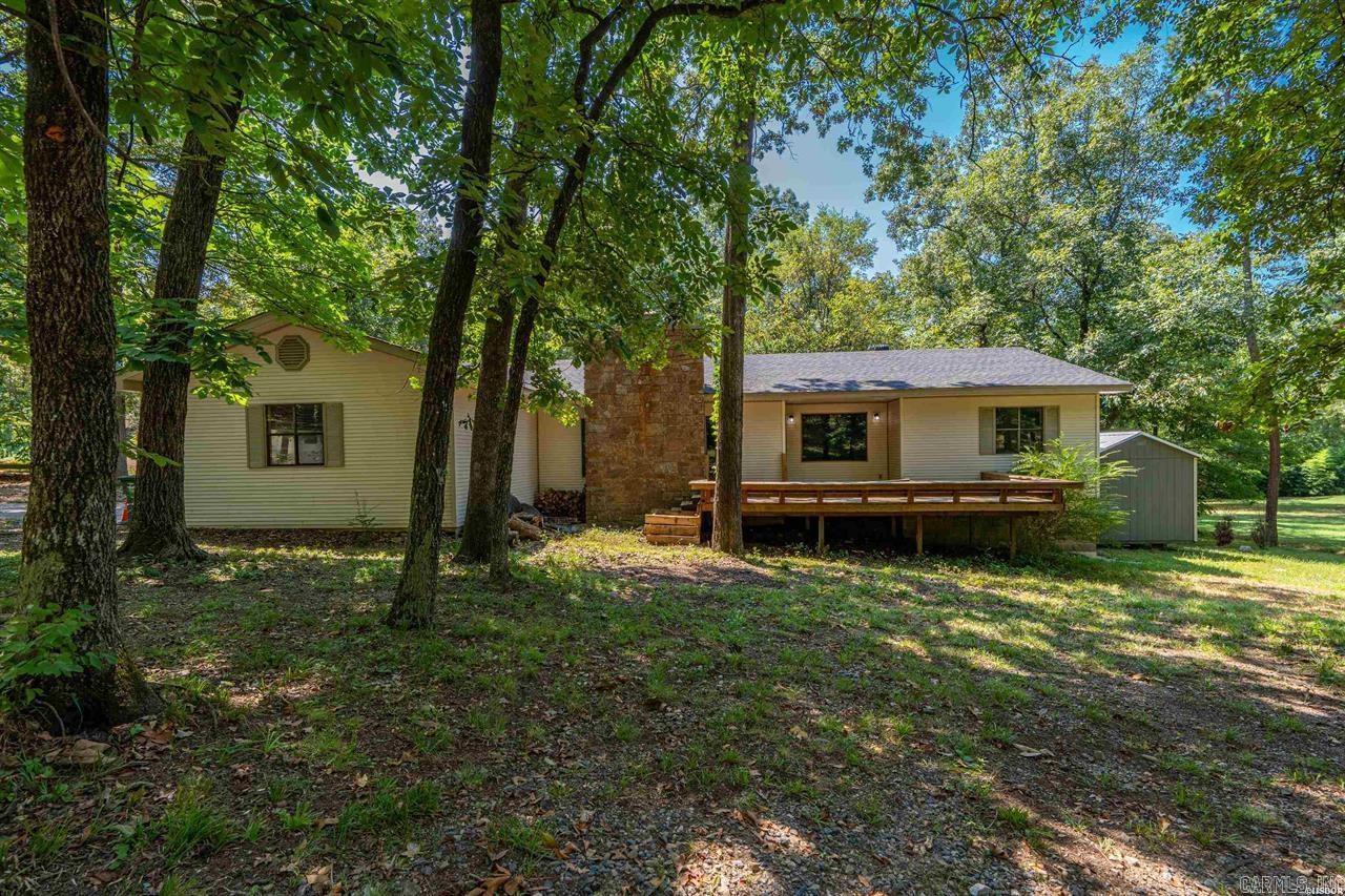 Check out this beautiful home located in Lake Hamilton School District! This 3 bedroom, 2 bath home on 1.67 acres gives you 2,084 square feet of space & plenty of room to live comfortably. Fresh paint brightens the interior, & youāll love the spacious living room with the option of a wood or gas burning fireplace, a dining room thatās perfect for family dinners (or takeout nights you want to feel fancier about), & a private master suite with an oversized walk-in closet. Major updates are already checked off the list with a one-year-old roof and a two year-old water heater. Out back, the huge covered deck with brand new railings is ready for morning coffee, evening cookouts, or just enjoying the peace and quiet of the neighborhood.