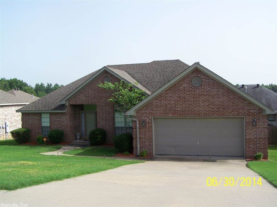 Absolutely gorgeous home in Western Hills. This home features beautiful hardwood floors and crown molding throughout. There's a separate dining room & large great room with inviting fireplace. The open eat-in kitchen has breakfast bar and access to deck. The master suite is very spacious and the large master bath has jacuzzi tub, separate shower, two vanities, large walk-in closet. One year home warranty offered. Bring us an offer!