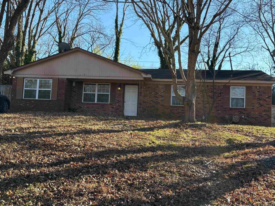 Charming and inviting 3-bedroom, 2-bath ranch-style home in West Helena that’s full of space and potential. Inside, you’ll find brand-new carpet, tile floors, a welcoming kitchen with a breakfast bar, and a private master suite designed for everyday comfort. The converted carport adds a bonus family room, creating flexible living space perfect for entertaining, relaxing, or giving everyone room to spread out. Outside, the flat backyard offers easy outdoor enjoyment, and the wide two-car driveway provides plenty of parking. Conveniently located near shopping centers and local amenities, this home is a fantastic opportunity for a family looking for long-term stability or an investor seeking a solid income-producing property.