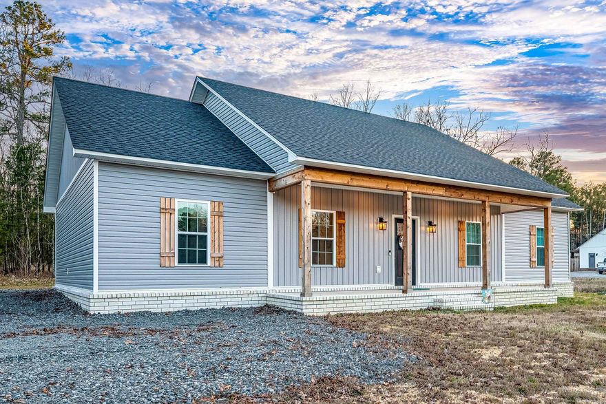 This warm and inviting front porch greets you to this beautiful home on round mountain! Walk into this open concept home perfect for gatherings! Gorgeous Granite and beautiful cabinets with zellige backsplash! Stainless steel appliances and a deep sink with a huge island in the kitchen is a must see! 3/2 split floor plan with large rooms and a to die for master bath!! Soaker tub and tile shower with 2 sinks and walk in closet in master bath. Out back there is a large covered area looking out onto your wooded acre! Come see this today before it is gone!