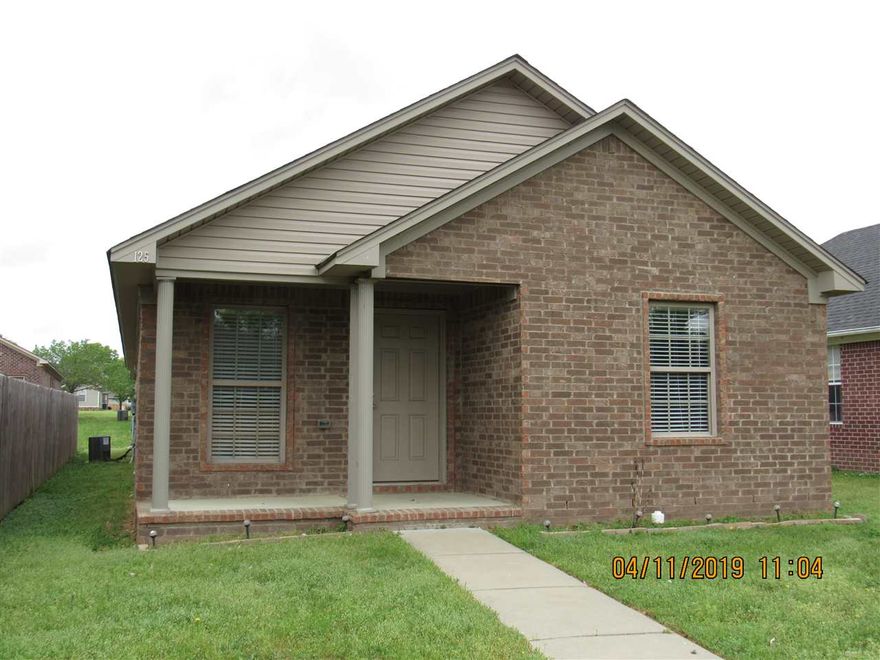 Well maintained 3 bedroom home, stained concrete floors throughout, split bedroom plan, 2 inch faux wood blinds, all kitchen appliances including refrigerator, washer & dryer hook-ups, all electric, rear entry 2 car garage.