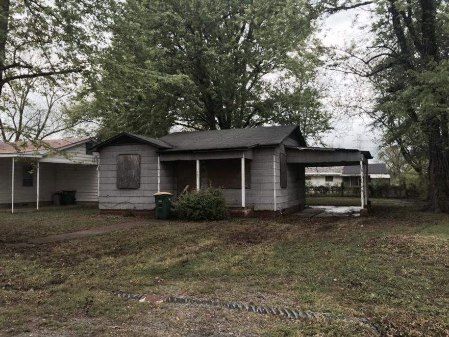 Buy this, fix it up and have a rental very inexpensively.  Close to a bus route.    AGENTS SEE REMARKS