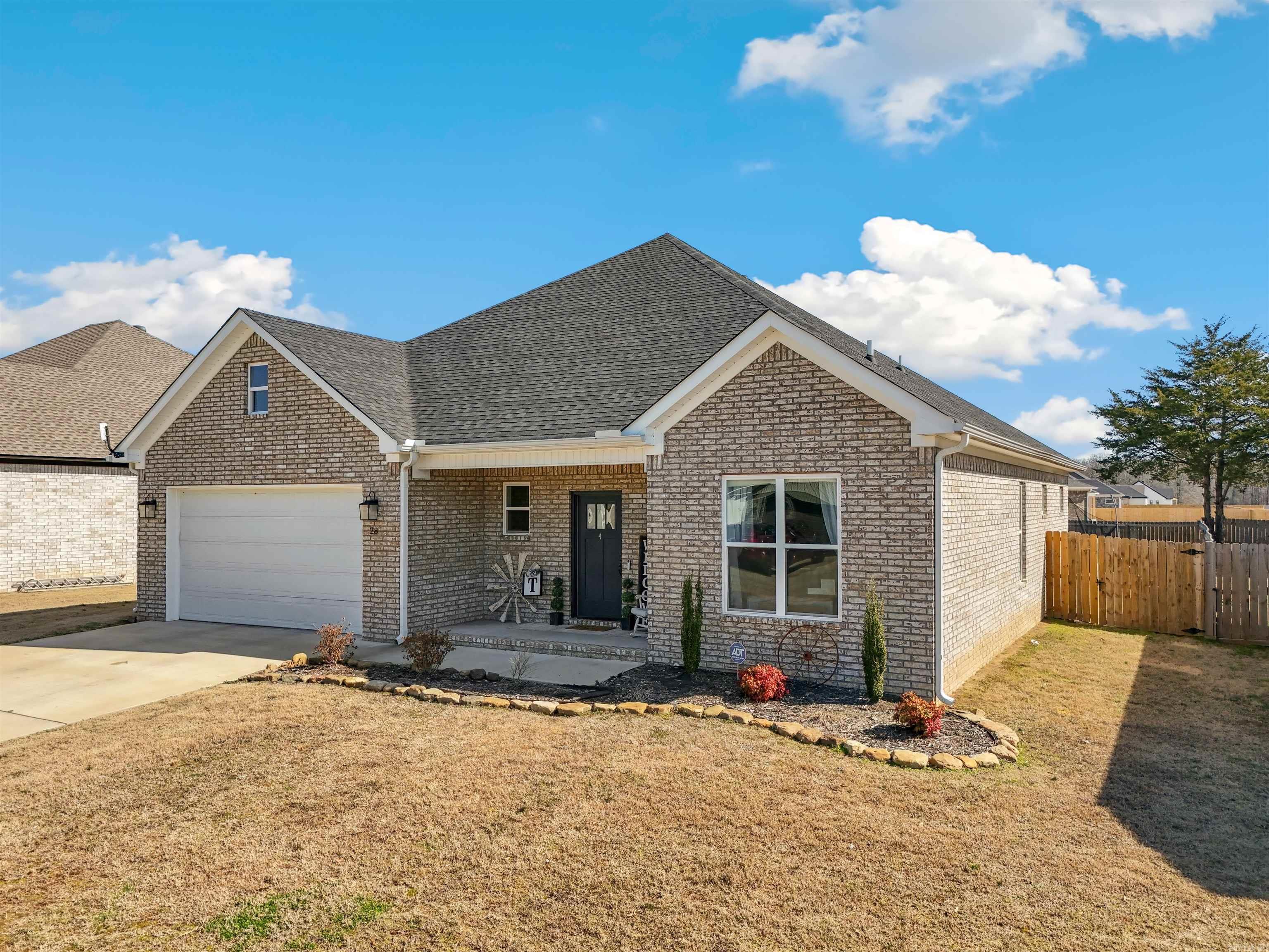 Move-in ready, newer, 3 bed, 2 bath home in the heart of Greenbrier! Home was built in 2021 and has an open floor plan with 1760 sf. Luxury vinyl flooring in main areas, a pantry, granite counters, a gorgeous walk-in shower, gutters, and a fenced-in back yard with an extended patio area are just some of this home niceties. Be sure to click the links for the 3D tour and aerial drone footage! Ready to make this home yours? Call to schedule your showing today! Agents see remarks and docs for more info.