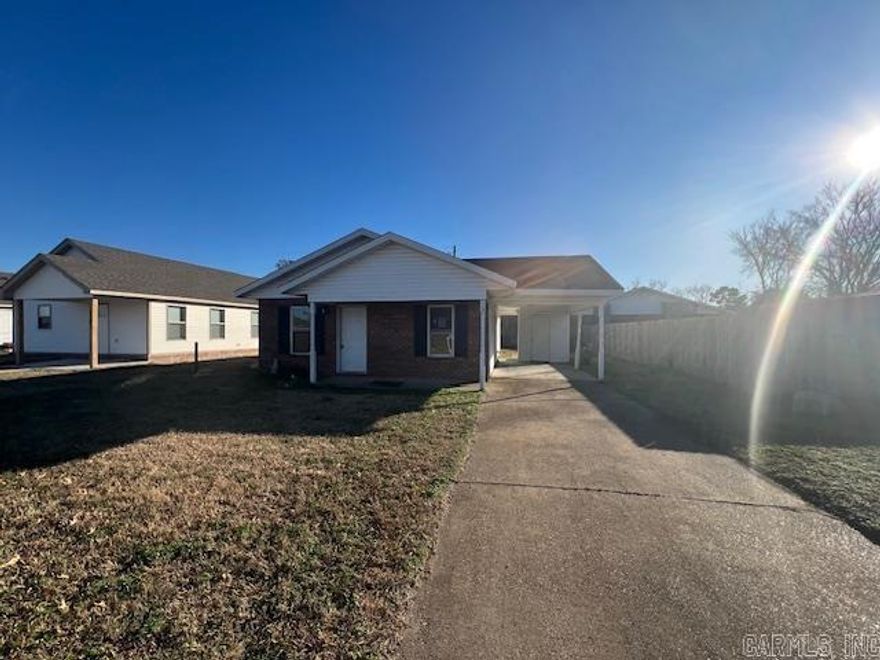 Cute and Cozy detached residential property on a slab foundation.  Three bedrooms and one bathroom with a good curb appeal.  The kitchen has plenty of cabinets for storage.  The single car attached carport has a storage room for all the extras. See agent remarks.