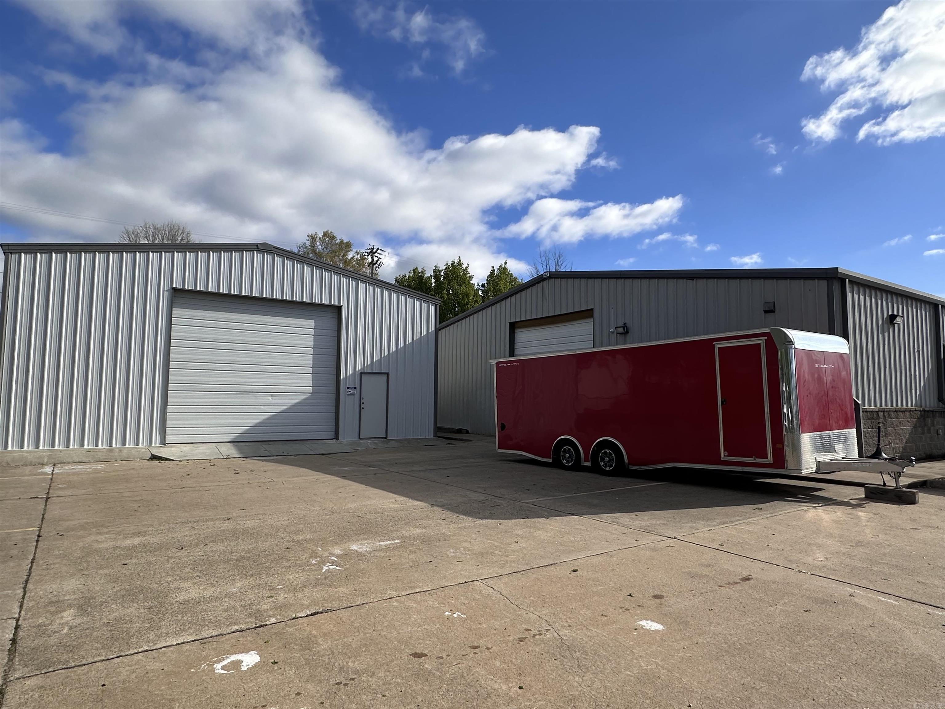 Fantastic opportunity in a prime location featuring two spacious buildings. The main building, encompassing 4,800 sq ft, is climate-controlled and currently operates as a successful cabinet shop equipped with multiple CNC machines. The secondary building, measuring 2,400 sq ft, serves as a fully insulated (spray foam) storage space. There is a large parking lot conveniently situated in the center of everything! The seller is motivated to sell and is open to collaborating with potential buyers. Don't miss out on this incredible chance!