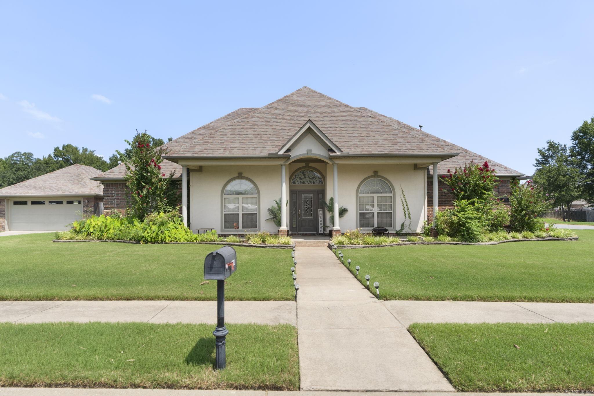 Welcome to the charming Heritage Farm Subdivision and 3501 Hemlock Cove!! Nestled on a large corner lot, this beautiful home features a large covered front and back porch, perfect for outdoor living. Inside, the spacious primary suite boasts a walk-in shower, jetted tub, and double vanity. With two guest bedrooms and a flexible room that could serve as a bedroom or office, this home offers plenty of options. A bonus room upstairs adds extra space for leisure or storage. The kitchen showcases custom cabinets, a breakfast bar, and adjacent dining areas, including a formal dining room and breakfast nook. A 2-car side-load garage and a detached 20x20 insulated shop with electricity, overhead door, nice built ins, and large covered patio area in back provide ample storage and workspace. Enjoy privacy and comfort in the large backyard, with a covered patio ideal for entertaining. This home blends modern features with functional design in a fantastic location. Call TODAY for your private viewing!
