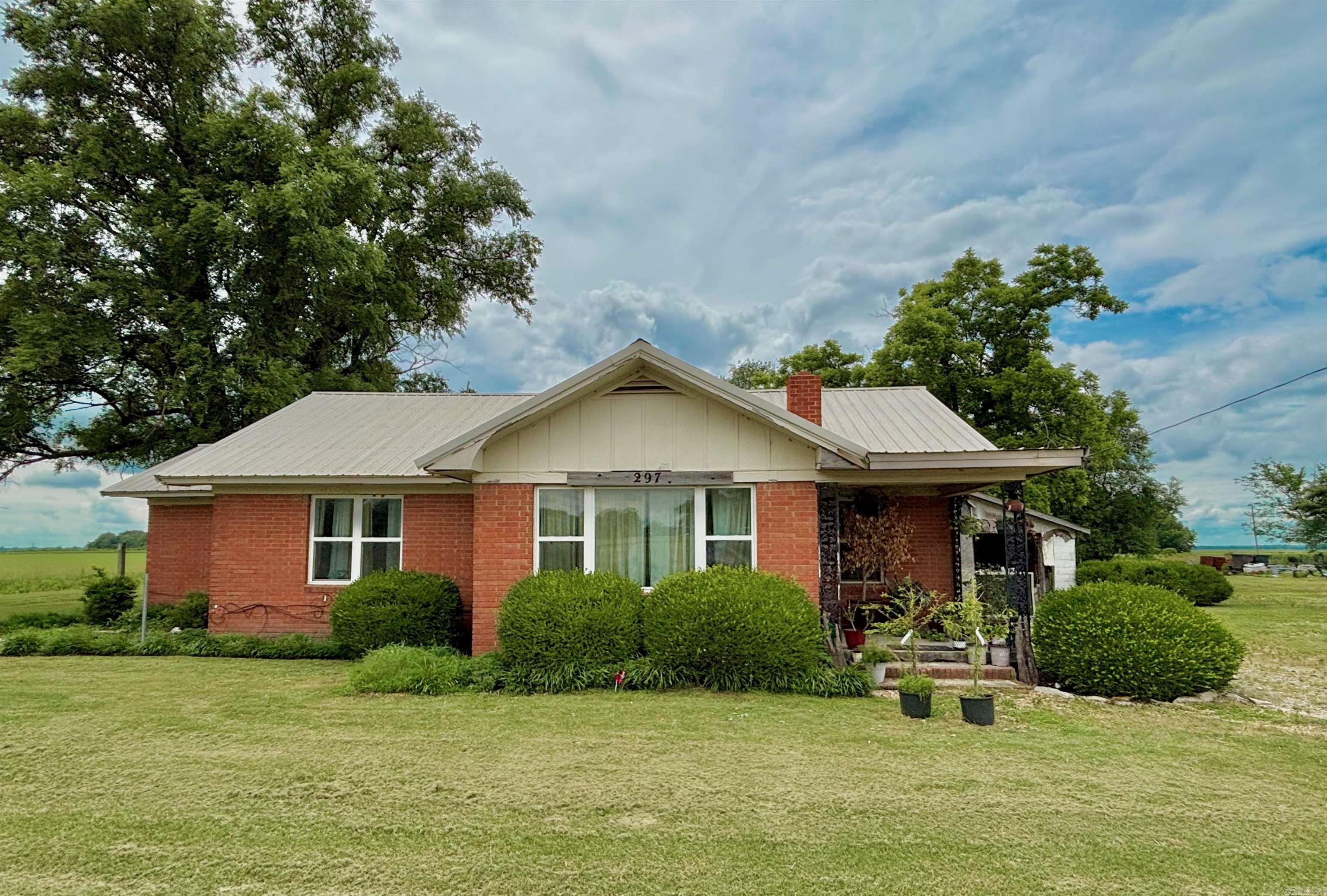 Charming 3-bedroom, 1,318 sq ft home on 1 acre +/- offers the best of both worldsāpeaceful country living with the convenience of town just minutes away. This versatile property is perfect for aspiring homesteaders, or those looking to create a cozy duck lodge or potential rental/flip. The home features comfortable living space with room to make it your own. A storm cellar provides added peace of mind and protection during severe weather. Outside, you'll find a small shop for hobbies or storage, plus two additional concrete padsāideal for building, parking, or working on vehicles and equipment. There's plenty of space for a garden, chickens, or even a few animals. Whether you're looking to live off the land, start a rental property, or have a quiet retreat close to nature, this property offers flexibility and room to grow. A rare opportunity with endless potential! Call today to schedule a showing!