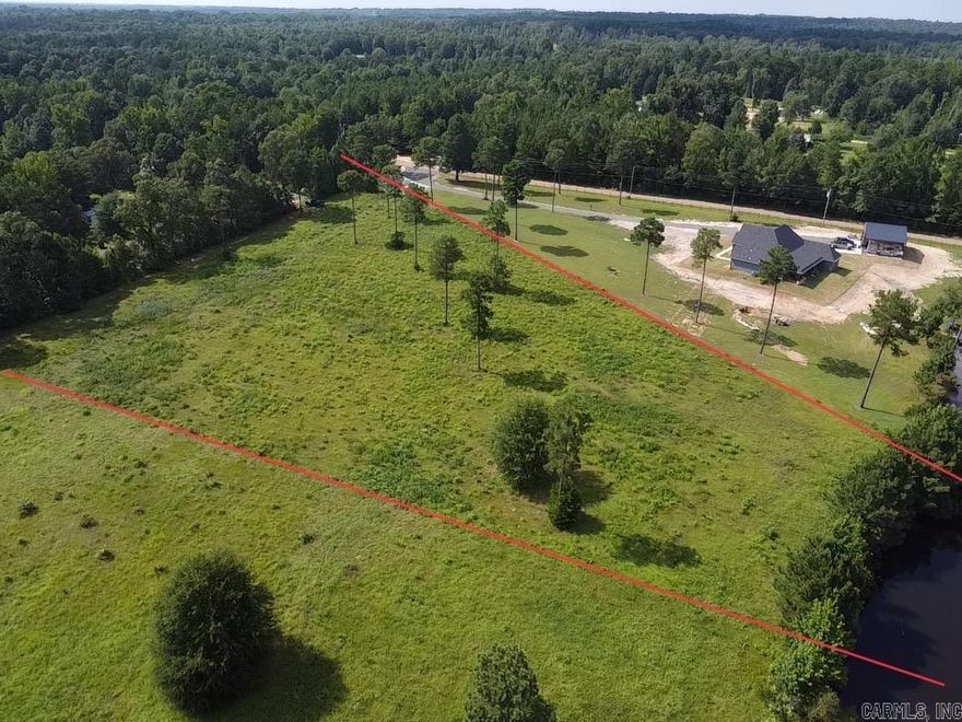 This beautiful 3.94 acres with pond access is the perfect spot to build your dream home. Located on the outskirts of Texarkana this acreage provides all the cozy country feeling with all the city amenities at your fingertips.   Subdivision does have building restriction requirements.