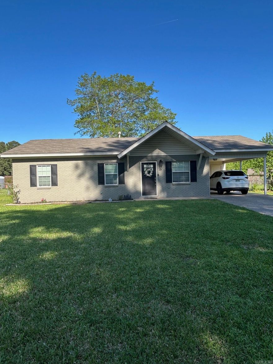 Adorable updated home with open floor plan, nice sized laundry room, updated finishes, and stainless appliances, pantry, breakfast bar, guttering, fenced back yard, storage building, nice yard.  cutest house in the neighborhood!!  Dont miss this one..agents see remarks