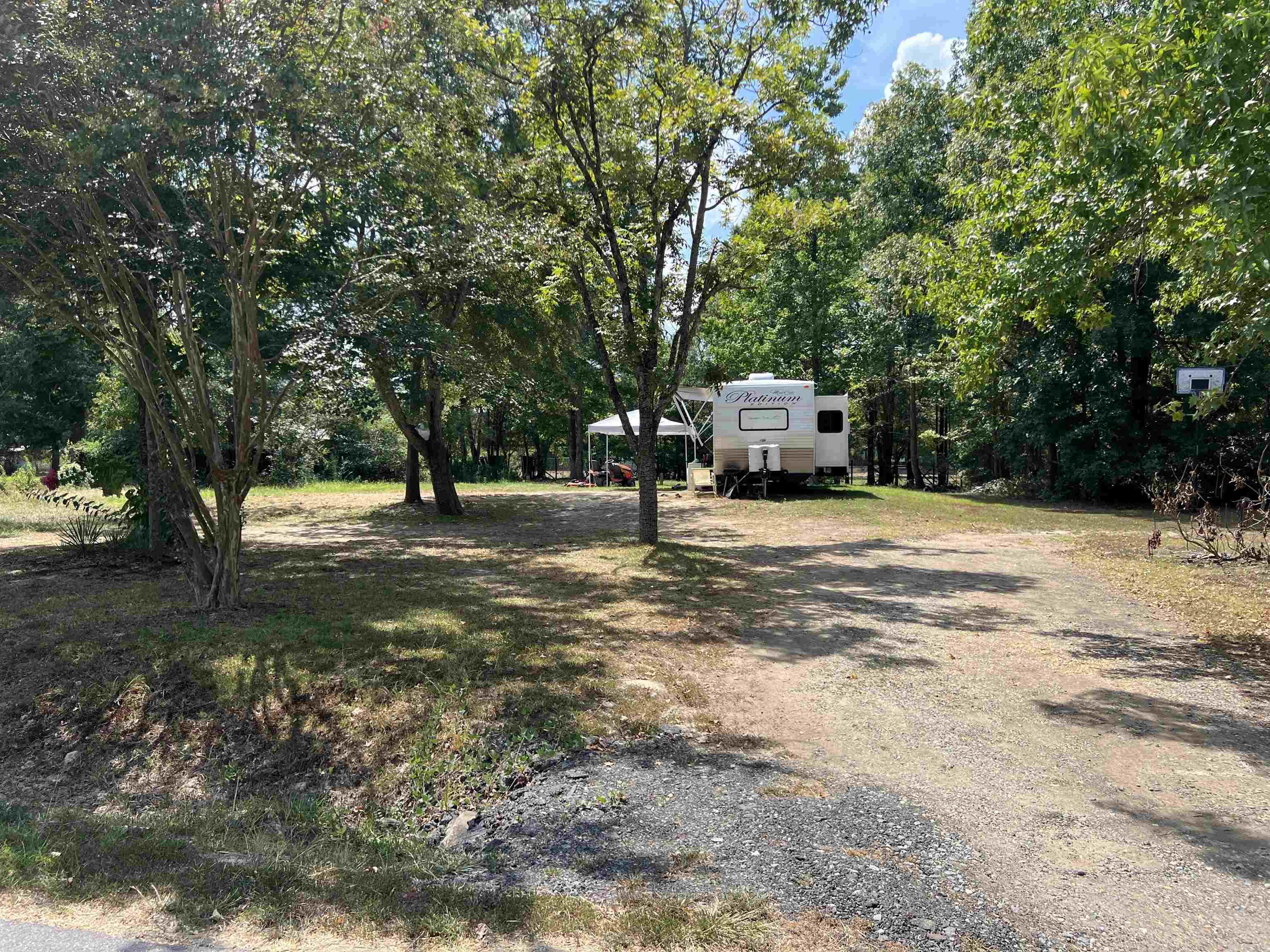 Great investment opportunity on the .46 acre lot that has one rv space currently rented and two more on property.