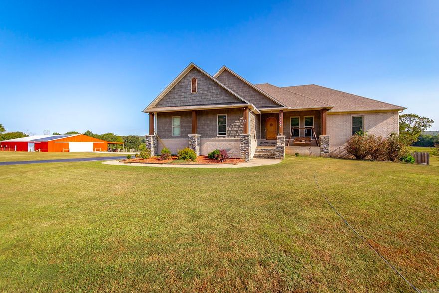 Seller Motivated !!! SOLAR FOR ENTIRE HOME AND POOL . This absolutely wonderful home has 3 bedrooms and 3 FULL bathrooms on main level . Very spacious kitchen with a double oven replaced in 2024 , new dishwasher in 2025, New under counter ICE maker replaced 2025 ,Elevator, Just put a new battery in elevator in 2024 ,2 car garage on main level with a built in ramp Downstairs there is a 1 car garage, stair access , FULL kitchen FULL bathroom and a separate room could be office or bedroom with garage access Living area ,storage area . Oven downstairs was replaced in 2023 dishwasher downstairs replaced in 2023 hardly ever used ,Outside you have an awesome pool 3 covered areas for entertaining . The pump room also has a half bath. huge barn 50X100 also has separate room for shop with a window in shop. The home is equipped  with instant hot water throughout the entire home There is an additional 19.84 acres available for purchase , if just the 7 acres and barn and home are purchased there will be a 20 foot easement .