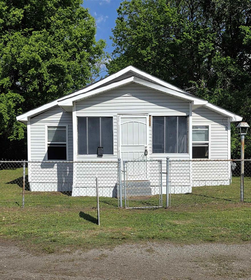 Charming 2-Bedroom Home – Great Investment or First-Time Buy!  This 2 bedroom, 1 bathroom home offers a functional layout with a separate dining room, perfect for gatherings or everyday living. Whether you're looking for a solid investment property or a place to call your first home, this property has great potential. New windows throughout!  Don’t miss this opportunity to own a home with versatility and value!