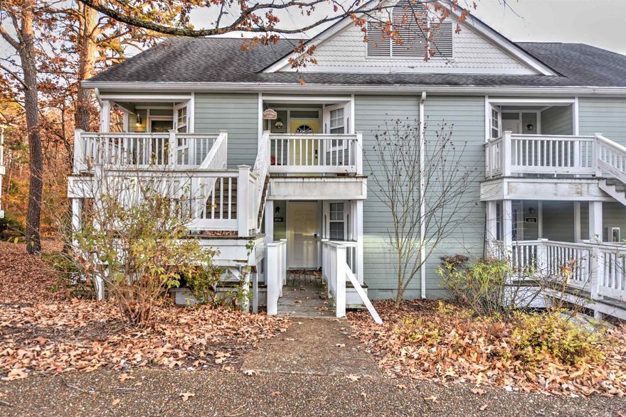 Experience the ultimate in serene living with this exquisite Summer Hill Place condo, perfectly nestled amidst the lush canopy of the Ozark Mountains. This recently updated studio offers a seamless blend of modern elegance and nature’s tranquility. Step inside to discover a beautifully refreshed interior, boasting new floors and a fresh coat of paint, complemented by stylish furnishings that invite you to settle in immediately. Designed with efficiency and comfort in mind, the studio features a cozy sleeping area, a sleek bathroom with a rejuvenating shower, and a well-appointed kitchenette that makes meal preparation a pleasure. A stackable  washer and dryer provide added convenience for everyday living. For moments of relaxation, step out onto your private back deck and lose yourself in the serene views of the surrounding woods. Enhance your lifestyle with access to an array of resort-style amenities right at your doorstep. Dive into any of the three sparkling pools, perfect your swing at the two beautifully maintained golf courses, or explore the pristine waters of nearby Greers Ferry Lake. Plus, enjoy all the vibrant recreational and cultural offerings of Fairfield Bay.