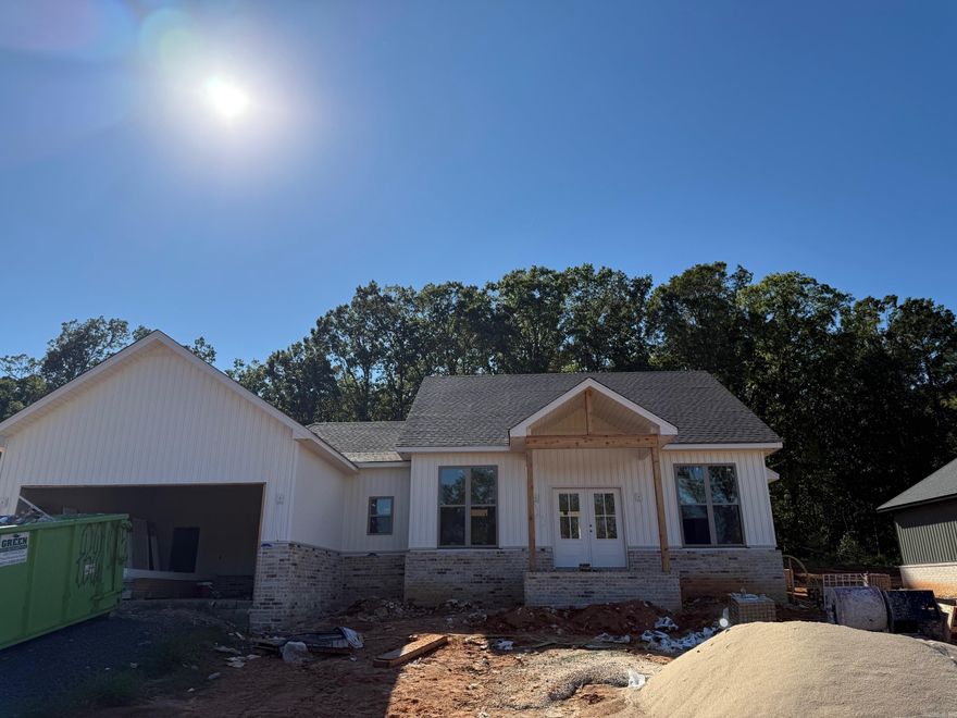 Discover the perfect blend of elegance and comfort in the stunning all-brick, Acadian style home. With 4 spacious bedrooms and 2 luxurious bathrooms, this exquisite property offers an inviting retreat for both relaxation and entertainment. As you step through the front door, you'll be greeted by an expansive living area bathed in natural light, thanks to the large windows that highlight the beauty of your surroundings. Culinary enthusiasts will adore the kitchen and large pantry for extra organization and storage. The custom tile shower in the primary bathroom adds a spa-like experience to your daily routine. Outdoor living is equally impressive with a large, covered patio providing the perfect backdrop for weekend entertainment. Additional features include a two-car garage offering ample parking space and storage. This home is a haven of sophistication and warmth, ready for a family to create lasting memories.