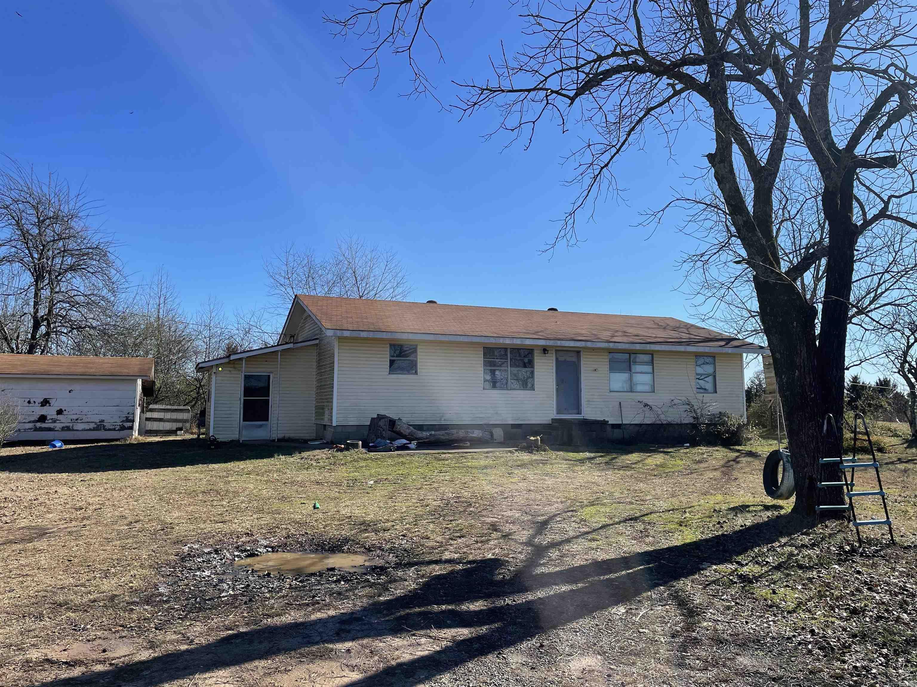 Beautiful home site on top of ridge . This is Nice built older home with garden area, fruit trees, storm cellar, sheds on a nice property. The area is freshly cleaned from brush and has fresh gavel on the driveway. Home passed inspection, is functionable as is but could use some updates. This has two nice buildings to north with a large shop building on the south side are offers in a separate sale but can be bought but is not included at $150K price . More land is also available for an extra charge. The current price includes a light bathroom remodel, two new exterior doors  with material and labor to at the descension of the seller.