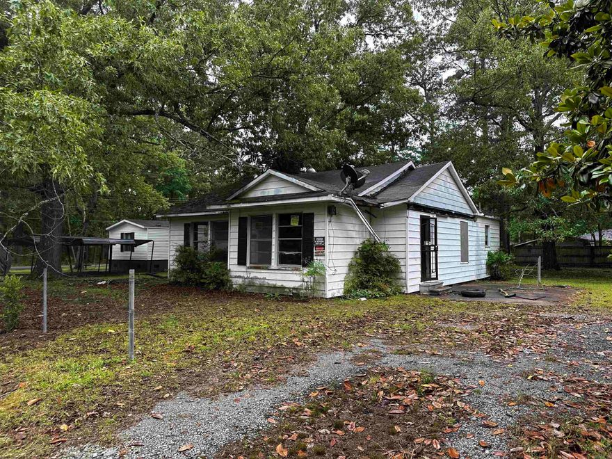 Investment opportunity in Pine Bluff! This 2-bedroom, 2-bath home offers approximately 1,300 sqft of living space and strong potential for investors looking to expand their rental portfolio or secure an affordable value-add property.  The home features a functional layout with spacious living areas, well-sized bedrooms, and multiple full bathrooms—making it appealing for long-term tenants or future resale potential. With the right updates and vision, this property can become a solid income-producing asset.  Conveniently located near schools, shopping, dining, parks, and major roadways, the property offers accessibility and everyday convenience for future occupants. Pine Bluff continues to present attractive opportunities for investors seeking affordable entry points and long-term rental demand.  (Agents See remarks)