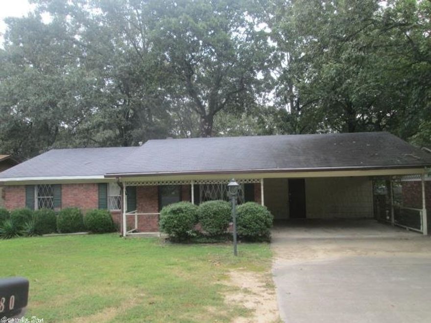 Brick home with attached carport. Three bedrooms and two baths on one level. In ground swimming pool and fenced backyard are added features. Close to downtown Sherwood with easy access to employment opportunities.